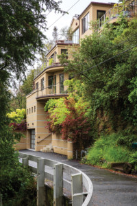 This hillside home blends seamlessly with the surrounding landscape.