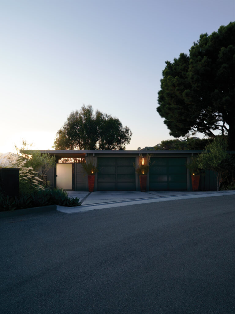 New garage doors and updated colors add curb appeal.